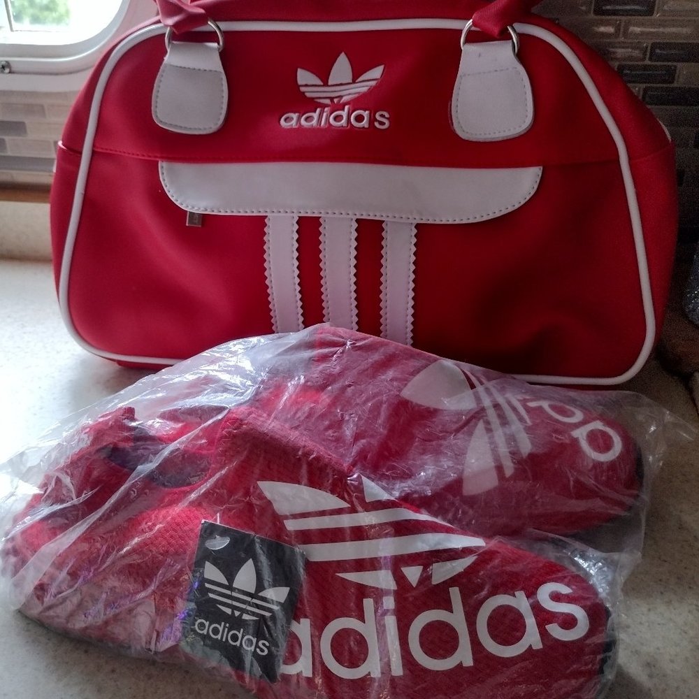 Red and white Adidas sneakers in matching handbag